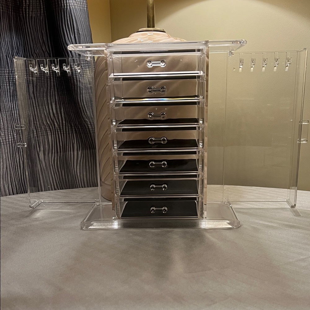 Plexiglass jewellery chests.